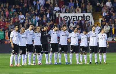 Valencia players stadning on the pitch